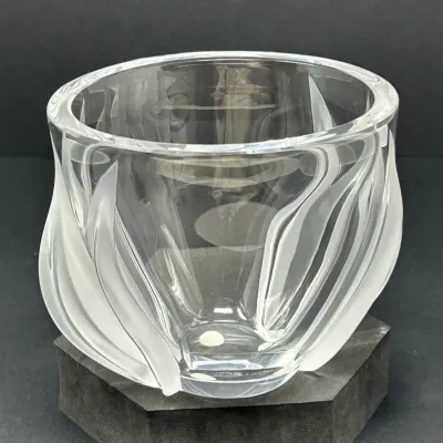 Sale Photo Thumbnail #38: Lalique clear and frosted crystal bowl with a flame motif, featuring thick polished walls and an etched signature on the underside.