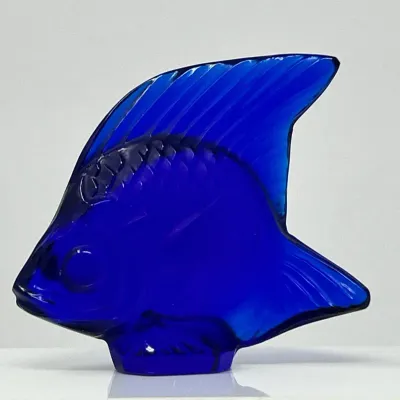 Sale Photo Thumbnail #119: Lalique-style cobalt blue glass fish figurine featuring textured fins and scale details.