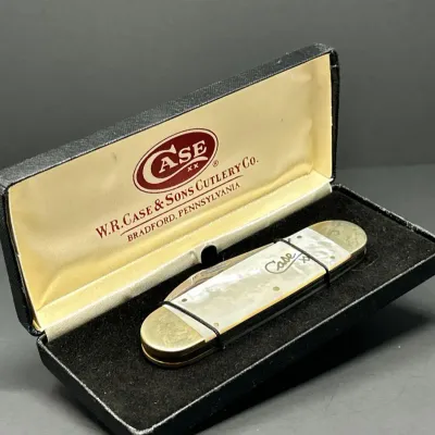 Sale Photo Thumbnail #169: Vintage Case XX mother-of-pearl pocket knife in its original W.R. Case & Sons Cutlery Co. fitted presentation box.