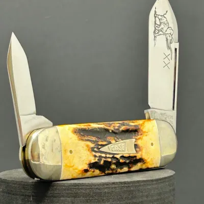 Sale Photo Thumbnail #190: Case XX two-blade elephant toe folding pocket knife featuring stag horn handles and polished stainless steel blades.