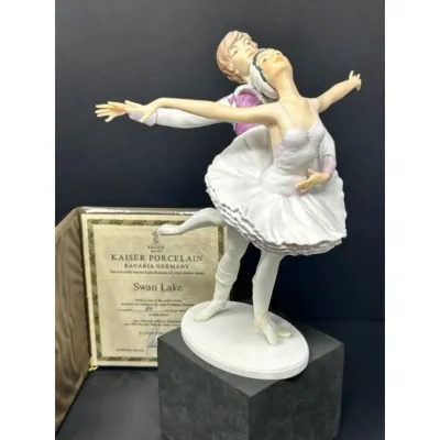Sale Photo Thumbnail #207: Kaiser Porcelain 'Swan Lake' ballet dancer figurine designed by Wolfgang Gauchel, accompanied by its original certificate of authenticity.