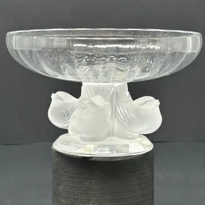 Sale Photo Thumbnail #96: Lalique-style crystal pedestal bowl featuring a clear glass basin supported by a frosted glass stem with detailed bird figures.
