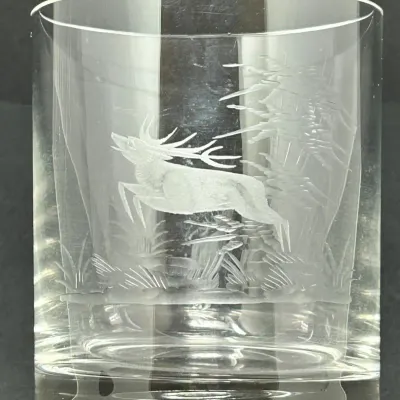 Sale Photo Thumbnail #76: Etched glass double rocks tumbler featuring a leaping stag in a forest scene.