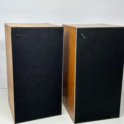 Sale Photo Thumbnail #87: Pair of vintage Bang & Olufsen Beovox 1702 bookshelf speakers with wood veneer cabinets and black fabric grilles.