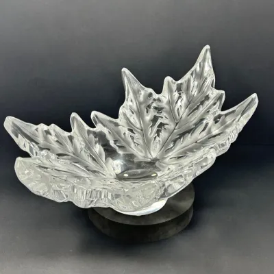Sale Photo Thumbnail #8: Lalique-style clear and frosted crystal maple leaf bowl, featuring detailed vein textures and a stylized organic form.