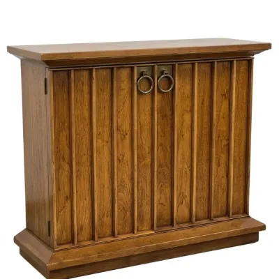 Sale Photo Thumbnail #158: Mid-century modern wood console cabinet featuring vertical slat door detailing and brass ring pulls.