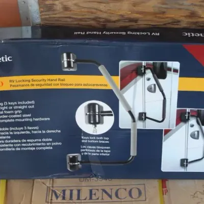 Dometic Milenco RV Locking Security Hand Rail in original box, featuring dual locking design and powder-coated steel construction.