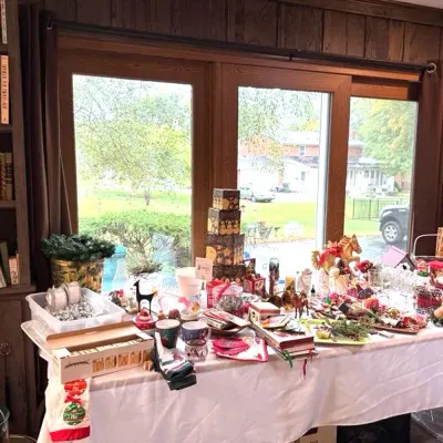 Sale Photo Thumbnail #7: holiday décor items including vintage ornaments, stacked decorative boxes, figurines, and linens, 