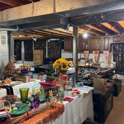 Sale Photo Thumbnail #13:  including holiday decorations, glassware, vintage pennants, trunks, and a model train set.