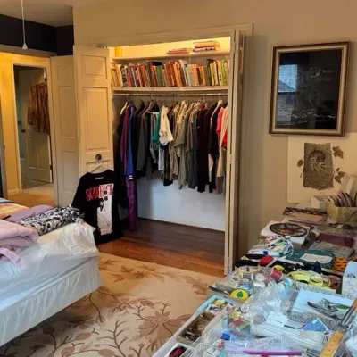 Sale Photo Thumbnail #21:  linens, clothing and books, framed artwork, and various craft supplies.