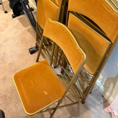 Sale Photo Thumbnail #47: Set of vintage metal folding chairs with mustard yellow velvet or faux-suede upholstery and gold painted frames.