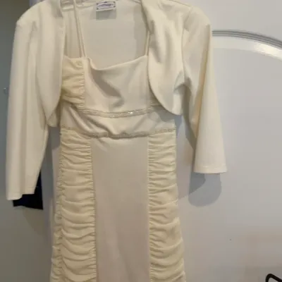 Sale Photo Thumbnail #67: Off-white sleeveless cocktail dress with ruched side panels and beaded under-bust trim, paired with a matching cropped bolero jacket.