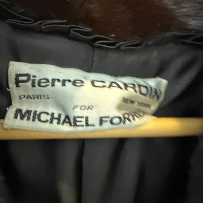 Sale Photo Thumbnail #88: Interior designer label on a vintage dark fur coat, featuring Pierre Cardin Paris New York for Michael Forrest.