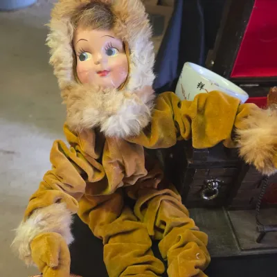 Sale Photo Thumbnail #47: Vintage poseable pixy or elf doll dressed in a gold velvet suit with faux fur trim.