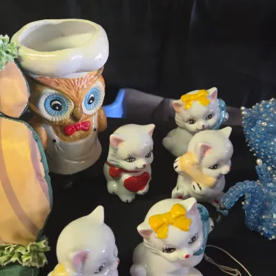 Sale Photo Thumbnail #45: Collection of vintage ceramic figurines, including white kittens on the phone and a chef owl utensil holder.