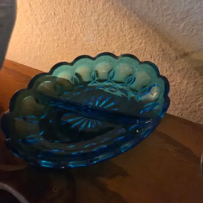 Sale Photo Thumbnail #98: Mid-century L.E. Smith Moon and Stars pattern teal blue glass divided relish dish with scalloped edges.