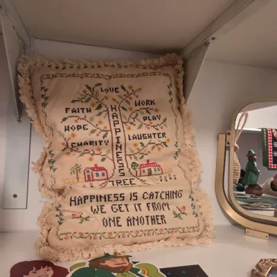 Sale Photo Thumbnail #135: Vintage embroidered throw pillow featuring a fringe border and inspirational text with a tree motif.