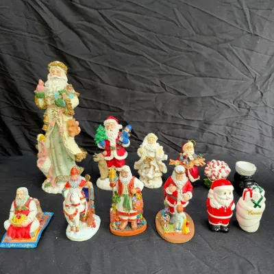 13-piece collection of diverse Santa Claus figurines