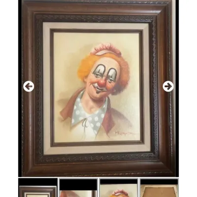 Sale Photo Thumbnail #27: Framed oil painting of a smiling clown, signed Hoppin, set in a carved wooden frame with a fabric liner.