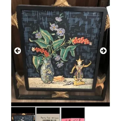Sale Photo Thumbnail #77: Framed 1940s floral and Asian figurine still life print by Ben Warter, set in a black frame with gold corner accents measuring approximately 23 by 28 inches.