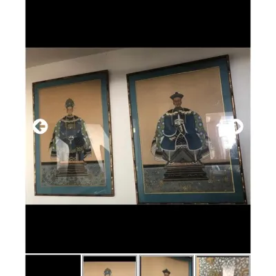 Sale Photo Thumbnail #93: Pair of framed Chinese Qing Dynasty-style ancestor portraits featuring a male and female figure in ceremonial robes, presented in blue matting and dark wood frames.