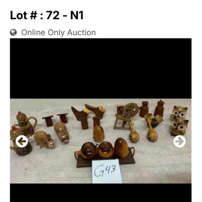 Sale Photo Thumbnail #43: Collection of vintage novelty salt and pepper shakers featuring wooden, ceramic, and figural designs including animals, teapots, and maracas.