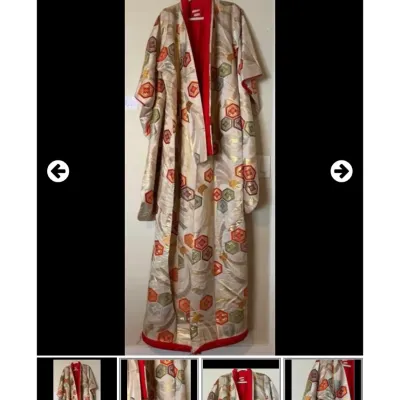 Sale Photo Thumbnail #84: Traditional Japanese embroidered kimono robe featuring metallic hexagonal and geometric motifs on a cream ground with bright red interior lining.