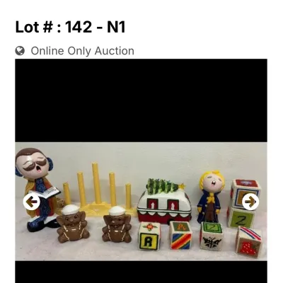 Sale Photo Thumbnail #70: Collection of holiday decor featuring choir figurine singers, a Christmas tree camper, plastic candlestick holder, and needlepoint alphabet blocks.