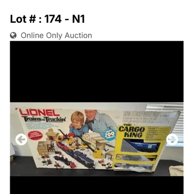 Sale Photo Thumbnail #79: Vintage Lionel Trains 'n Truckin' 'The Cargo King' electric train and truck playset in its original box, featuring over 200 pieces.