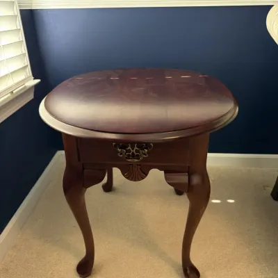Sale Photo Thumbnail #6: Queen Anne style oval end table in solid cherry with drawer, carved shell apron and brass pull