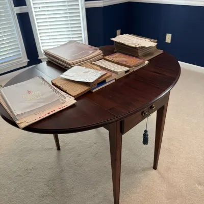 Sale Photo Thumbnail #8: Cresent solid mahogany Pembroke drop leaf table, shown with vintage sheet music and songbooks