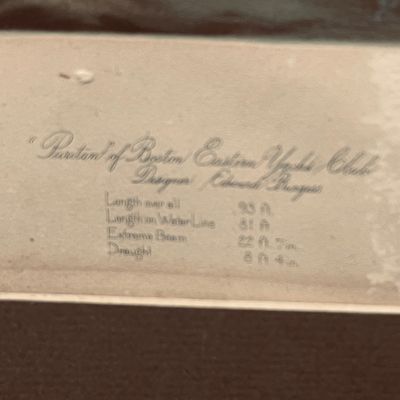 Sale Photo Thumbnail #16: Inscribed matting details for a maritime print of the yacht 'Puritan' of the Eastern Yacht Club, featuring specifications and designer Edward Burgess.