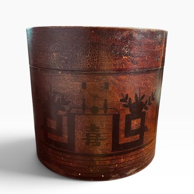 Sale Photo Thumbnail #43: Antique Chinese hand-painted lacquer hat box featuring a double happiness character and stylized motifs, showing heavy crazing and wear consistent with age.