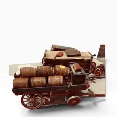 Sale Photo Thumbnail #29: Vintage miniature wooden beer wagon model, complete with six removable miniature barrels and spoked wheels.