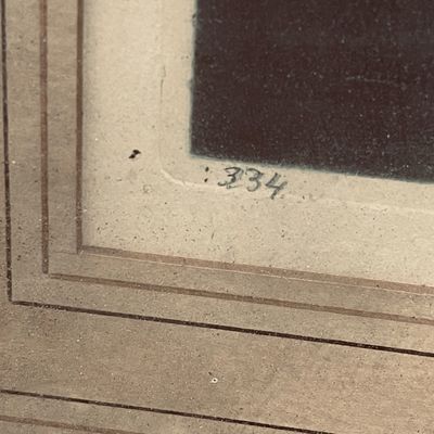 Sale Photo Thumbnail #9: Close-up detail of a framed artwork or print, showing a pencil-written edition or inventory number 334 on the matting.