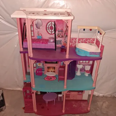 Sale Photo Thumbnail #664: 30x42
PLASTIC THREE-STORY DOLLHOUSE WITH ELEVATOR, BEDROOM, BATHROOM, LIVING ROOM, KITCHEN ACCESSORIES AND MORE. LIGHT DUST AND WEAR FROM USE AND STORAGE.