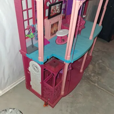 Sale Photo Thumbnail #670: 30x42
PLASTIC THREE-STORY DOLLHOUSE WITH ELEVATOR, BEDROOM, BATHROOM, LIVING ROOM, KITCHEN ACCESSORIES AND MORE. LIGHT DUST AND WEAR FROM USE AND STORAGE.
