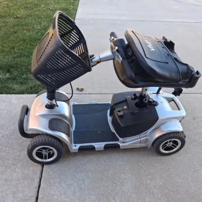 Sale Photo Thumbnail #10: Features:  

EASY MANEUVERABILITY: Four flat-free tires on a stable base let this 4 wheel scooter move across carpet, tile, sidewalks and gentle slopes with good control

VARIABLE SPEED CONTROL: Speed dial on this electric 4 wheel scooter for adults adjus