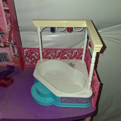 Sale Photo Thumbnail #665: 30x42
PLASTIC THREE-STORY DOLLHOUSE WITH ELEVATOR, BEDROOM, BATHROOM, LIVING ROOM, KITCHEN ACCESSORIES AND MORE. LIGHT DUST AND WEAR FROM USE AND STORAGE.
