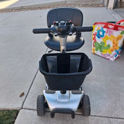 Sale Photo Thumbnail #5: Features:  

EASY MANEUVERABILITY: Four flat-free tires on a stable base let this 4 wheel scooter move across carpet, tile, sidewalks and gentle slopes with good control

VARIABLE SPEED CONTROL: Speed dial on this electric 4 wheel scooter for adults adjus