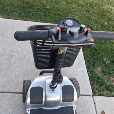 Sale Photo Thumbnail #9: Features:  

EASY MANEUVERABILITY: Four flat-free tires on a stable base let this 4 wheel scooter move across carpet, tile, sidewalks and gentle slopes with good control

VARIABLE SPEED CONTROL: Speed dial on this electric 4 wheel scooter for adults adjus
