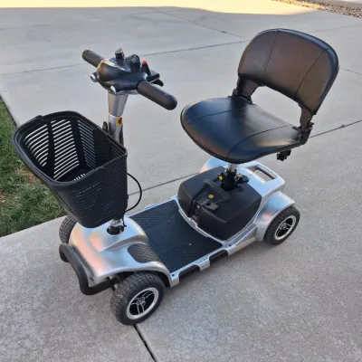 Sale Photo Thumbnail #3: Features:  

EASY MANEUVERABILITY: Four flat-free tires on a stable base let this 4 wheel scooter move across carpet, tile, sidewalks and gentle slopes with good control

VARIABLE SPEED CONTROL: Speed dial on this electric 4 wheel scooter for adults adjus