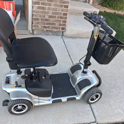 Sale Photo Thumbnail #6: Features:  

EASY MANEUVERABILITY: Four flat-free tires on a stable base let this 4 wheel scooter move across carpet, tile, sidewalks and gentle slopes with good control

VARIABLE SPEED CONTROL: Speed dial on this electric 4 wheel scooter for adults adjus