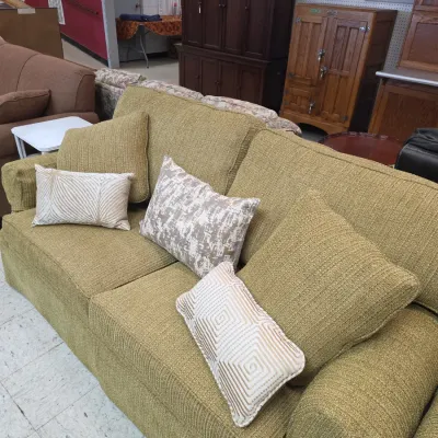 Sale Photo Thumbnail #11: Contemporary textured chartreuse green sofa styled with an assortment of patterned accent pillows.