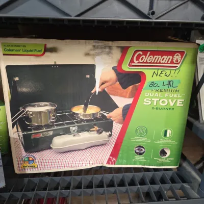 Sale Photo Thumbnail #148: Vintage Coleman Premium Dual Fuel 2-burner camp stove, new in its original retail box.