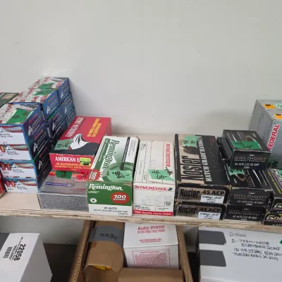 Sale Photo Thumbnail #97: Assortment of boxed .45 Auto and .45 ACP handgun ammunition from brands like Remington, Winchester, Nosler, Speer Gold Dot, and American Eagle.