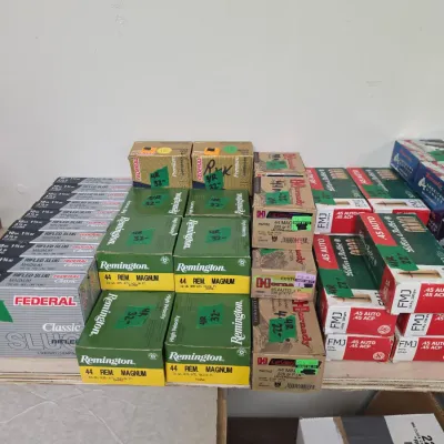 Sale Photo Thumbnail #98: Assortment of boxed ammunition, including Remington .44 Rem Magnum, Hornady .44 Mag, Federal Classic Rifled Slugs, and Sellier & Bellot .45 Auto.