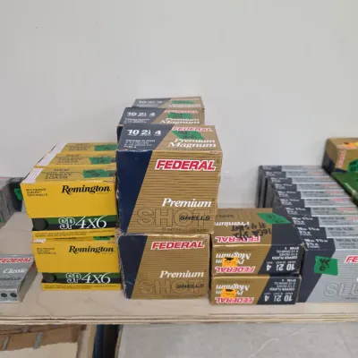 Sale Photo Thumbnail #99: Assortment of vintage ammunition boxes including Federal Premium Magnum shotshells and Remington SP4x6 turkey loads.