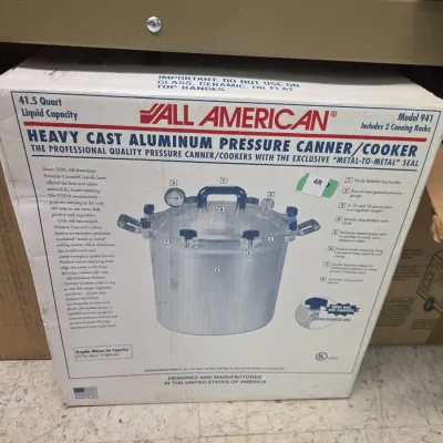 Sale Photo Thumbnail #42: All American Model 941 heavy cast aluminum pressure canner/cooker in original box, featuring a 41.5-quart liquid capacity.