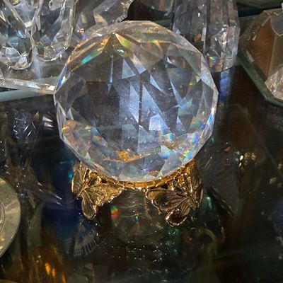 Sale Photo Thumbnail #500: Faceted Crystal Sphere on Butterfly Motif Stand